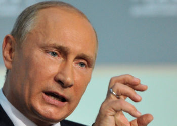 Russian President Vladimir Putin delivers his speech on the eve of the Asia-Pacific Economic Cooperation (APEC) summit in Vladivostok on September 7, 2012.  APEC leaders' summit in Russia's far eastern port city of Vladivostok will take place on September 8 and 9.    AFP PHOTO / POOL / ALEXANDER NEMENOVYURI KADOBNOV/AFP/GettyImages