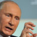 Russian President Vladimir Putin delivers his speech on the eve of the Asia-Pacific Economic Cooperation (APEC) summit in Vladivostok on September 7, 2012. APEC leaders' summit in Russia's far eastern port city of Vladivostok will take place on September 8 and 9. AFP PHOTO / POOL / ALEXANDER NEMENOVYURI KADOBNOV/AFP/GettyImages