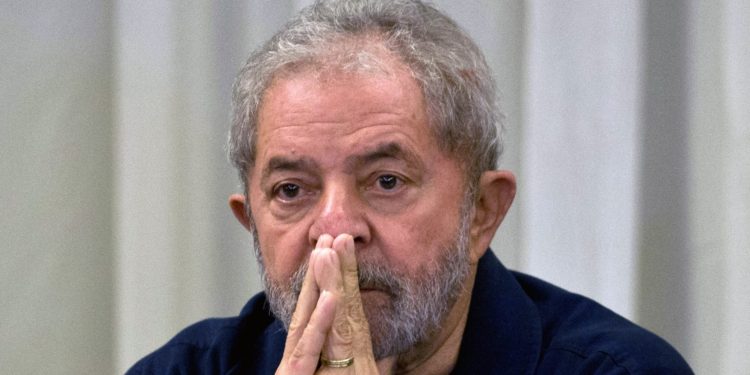 Former Brazilian President (2003-2011) Luiz Inacio Lula da Silva gestures during a meeting with the Workers' Party (PT) members in Sao Paulo, Brazil on March 30, 2015 AFP PHOTO / Nelson ALMEIDA (Photo credit should read NELSON ALMEIDA/AFP/Getty Images)