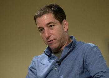 Journalist Glenn Greenwald speaks during an interview with the Associated Press in Rio de Janeiro, Brazil, Sunday, July 14, 2013.  Greenwald, The Guardian journalist who first reported Edward Snowden's disclosures of U.S. surveillance programs says the former National Security Agency analyst has "very specific blueprints of how the NSA do what they do."(AP Photo/Silvia Izquierdo)