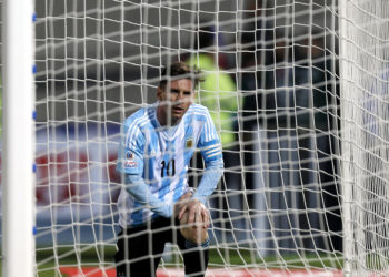 Argentina's Lionel Messi picks himself up after missing a chance to score against Chile during the Copa America final soccer match at the National Stadium in Santiago, Chile, Saturday, July 4, 2015. (AP Photo/Luis Hidalgo)