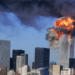 SEVENTH IN A PACKAGE OF NINE PHOTOS.–– An explosion rips through the South Tower of the World Trade Towers after the hijacked United Airlines Flight 175, which departed from Boston en route for Los Angeles, crashed into it Sept, 11, 2001. The North Tower is shown burning after American Airlines Flight 11 crashed into the tower at 8:45 a.m. (AP Photo/Aurora, Robert Clark)