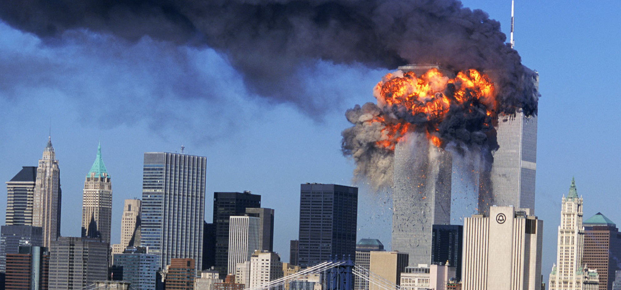 SEVENTH IN A PACKAGE OF NINE PHOTOS.–– An explosion rips through the South Tower of the World Trade Towers after the hijacked United Airlines Flight 175, which departed from Boston en route for Los Angeles, crashed into it Sept, 11, 2001. The North Tower is shown burning after American Airlines Flight 11 crashed into the tower at 8:45 a.m. (AP Photo/Aurora, Robert Clark)