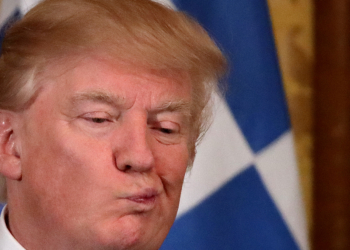 U.S. President Donald Trump reacts as he hosts a Greek Independence Day celebration at the East room of the White House in Washington, U.S. March 24, 2017. REUTERS/Carlos Barria     TPX IMAGES OF THE DAY - RTX32LJ2