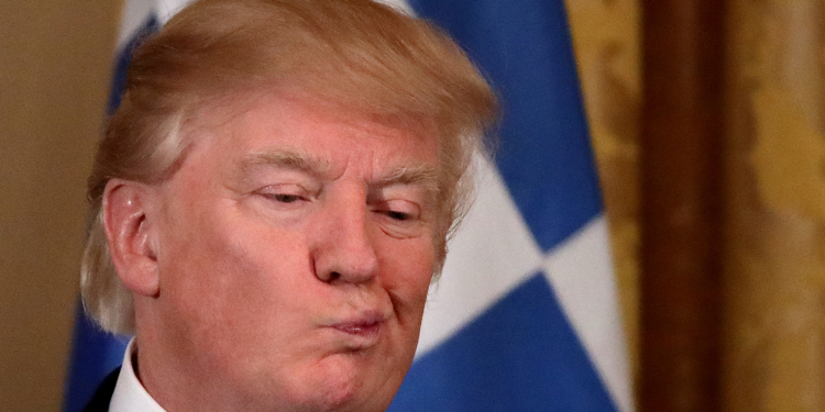U.S. President Donald Trump reacts as he hosts a Greek Independence Day celebration at the East room of the White House in Washington, U.S. March 24, 2017. REUTERS/Carlos Barria TPX IMAGES OF THE DAY - RTX32LJ2