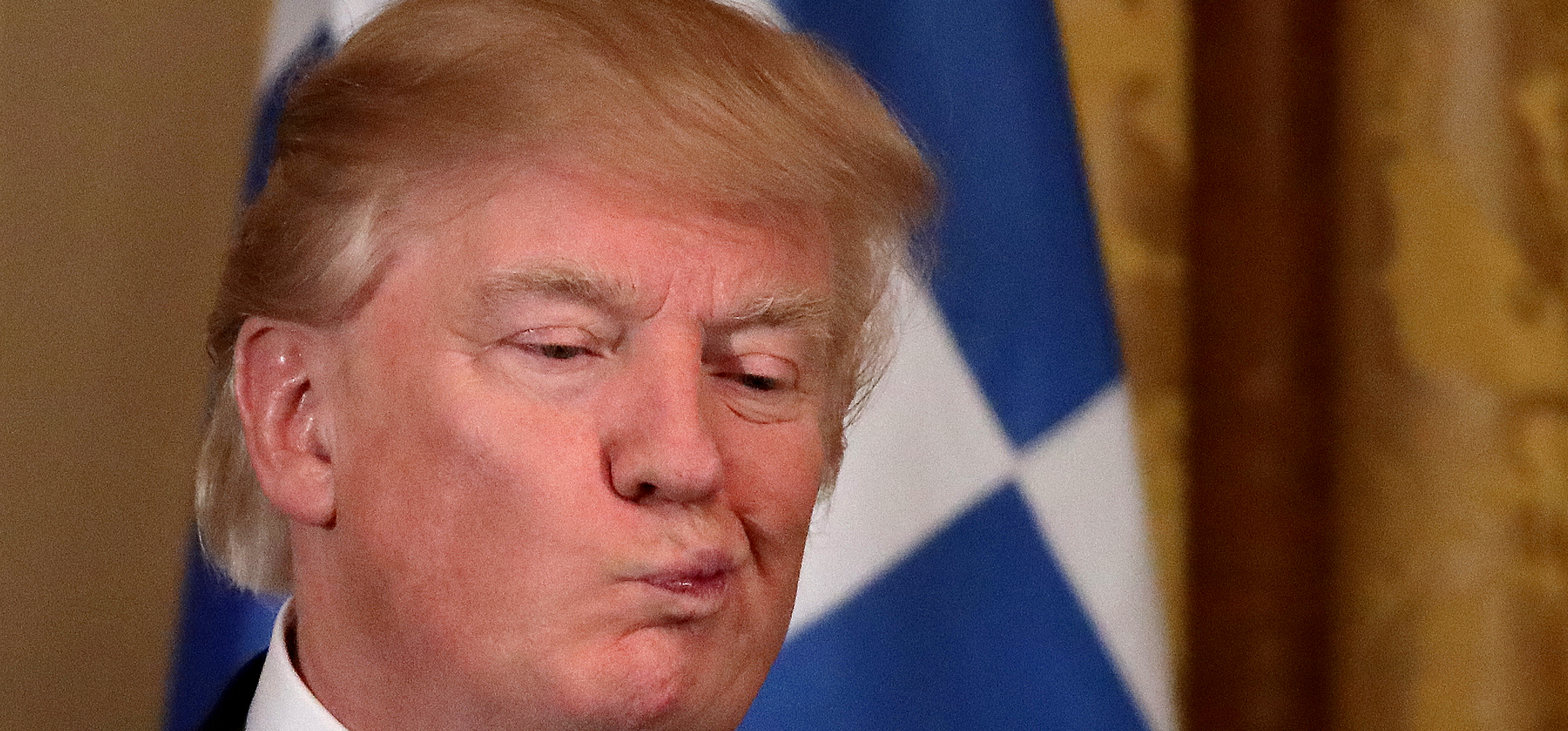 U.S. President Donald Trump reacts as he hosts a Greek Independence Day celebration at the East room of the White House in Washington, U.S. March 24, 2017. REUTERS/Carlos Barria TPX IMAGES OF THE DAY - RTX32LJ2