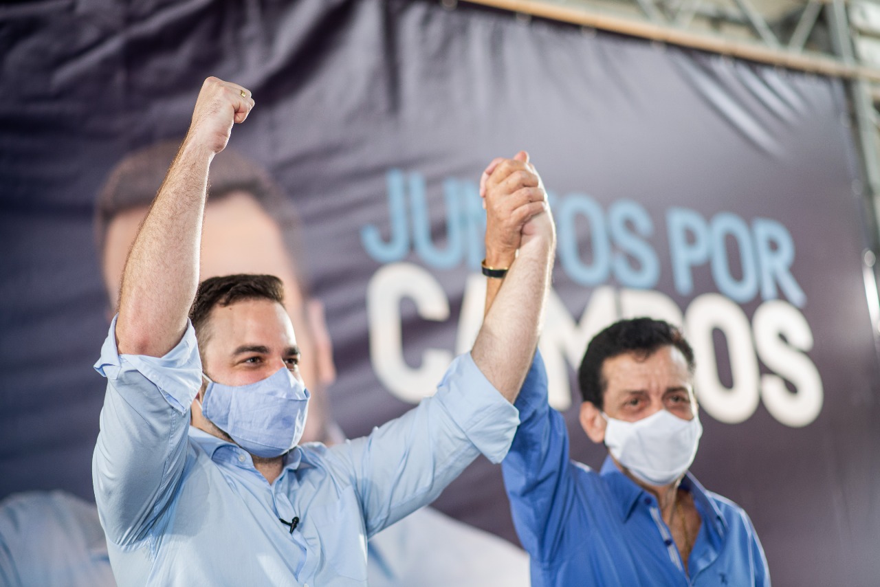 Caio Vianna e o pai Arnaldo em convenção do PdT