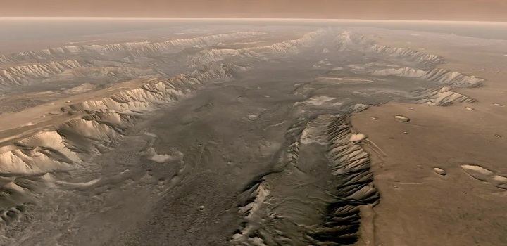 Marte tem sua própria versão do Grand Canyon (fissura natural resultante de constante erosão, no Arizona), e os cientistas descobriram que essa característica dramática é o lar de “quantidades significativas de água”