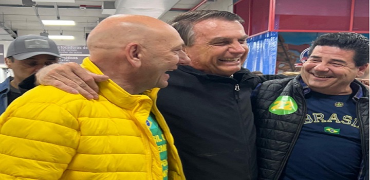 Hang, Bolsonaro e Dalçoquio durante encontro em outubro passado
© Reprodução