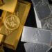 Ouro e prata caem com alta do petróleo e juros elevados nos EUA.