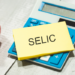 Redução da Selic para 14,25% pode afetar crédito, financiamentos e consumo. Especialistas apontam que juros ainda seguem elevados.