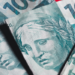 Tesouro Nacional informa que União desembolsou R$ 834,8 milhões em maio para cobrir dívidas de estados e municípios. Total em 2026 já chega a R$ 2,2 bilhões.