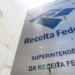 Receita Federal publica lista de devedores contumazes com foco em empresas do setor fumageiro e combustíveis. Dívidas superam R$ 25 bilhões.