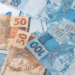 Tesouro Nacional aumenta a previsão de títulos ligados à Selic na dívida pública de 2026. Veja as novas faixas e a projeção de até R$ 10,3 trilhões.