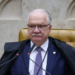 Fachin suspende decisões de André Mendonça e Flávio Dino sobre a direção da PF e mantém Andrei Rodrigues no cargo temporariamente.
