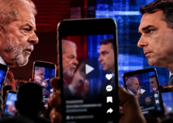 Cortes do debate entre Lula e Flávio Bolsonaro circulam nas redes sociais e influenciam a percepção do público. Entenda por que visualizações não significam mudança de voto.